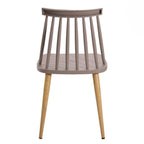 Gray spindle chairs at dining table